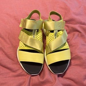 Neon yellow Sorel sandals